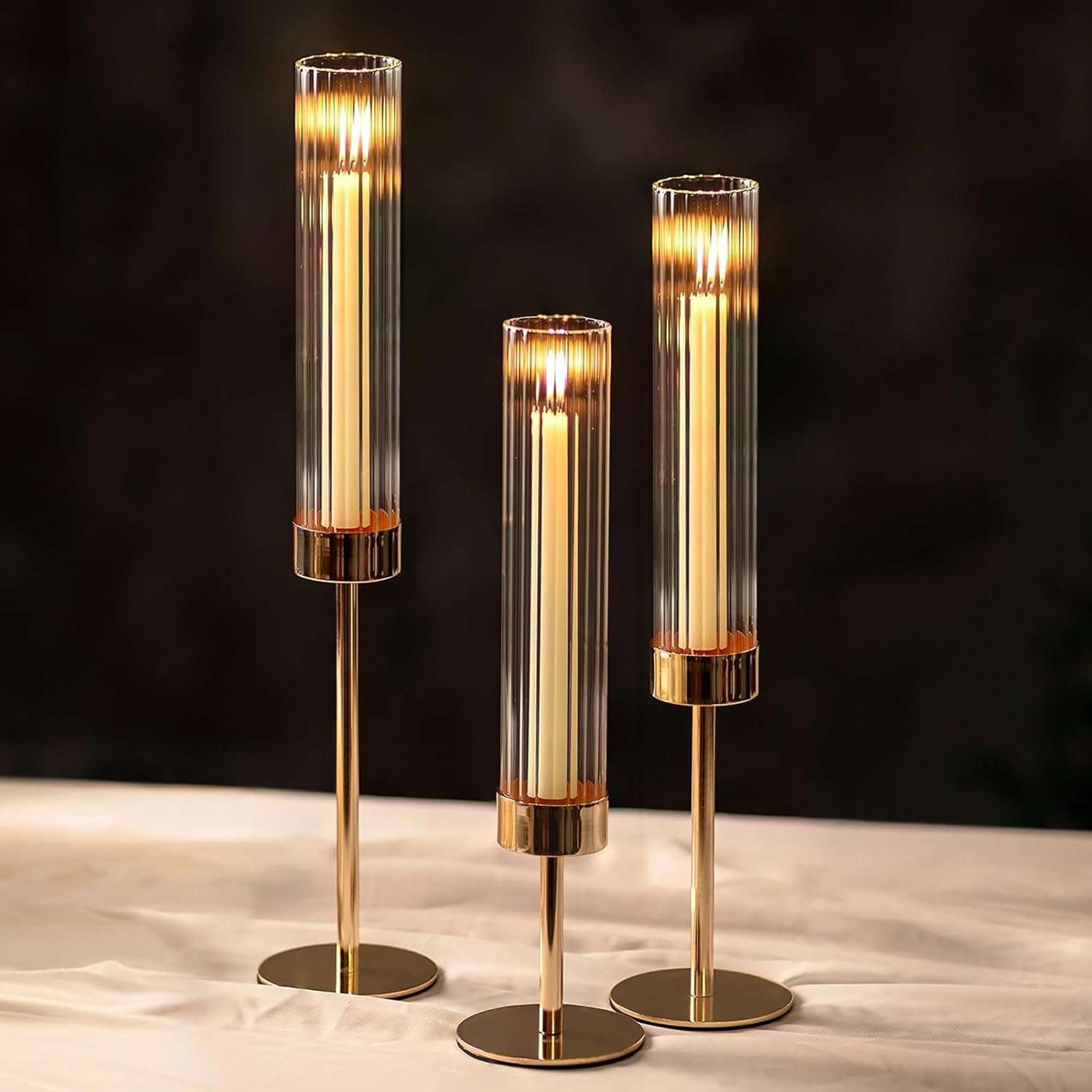 NUPTIO Tall Candlestick Holders for Centerpiece: Hurricane Candle Stick Holders with Ribbed Glass Sleeve – Gold Metal Candleholder Set of 3 for Table Fireplace Living Room Decor